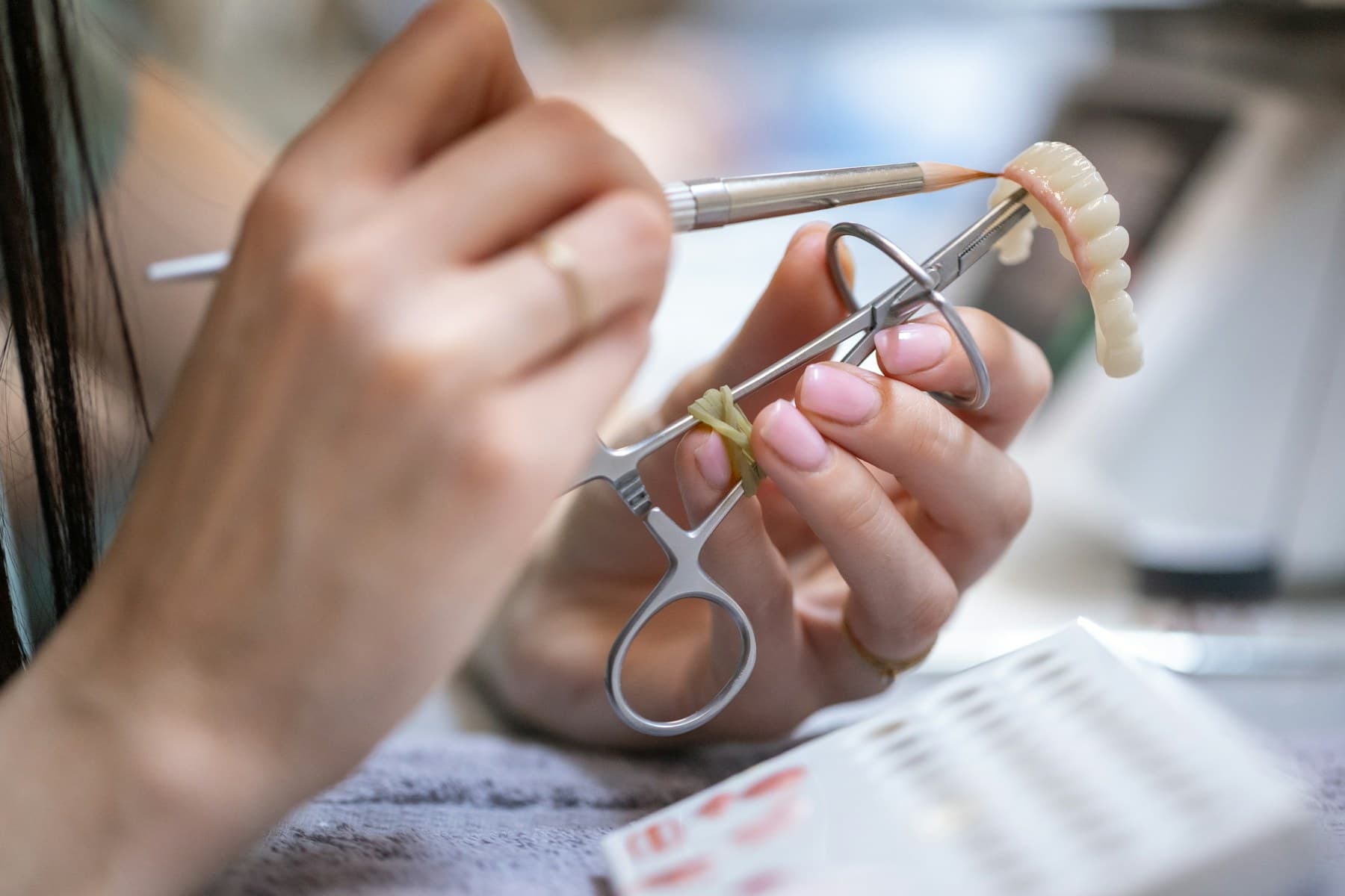 Precision dental laboratory work, stock photography